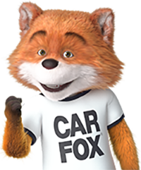 CARFAX Canada’s mascot, CAR FOX, fist-pumping in celebration.
