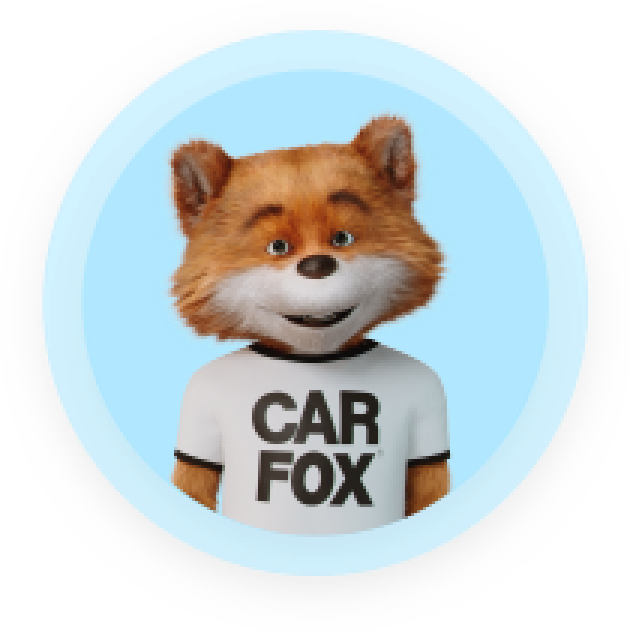La mascotte de CARFAX Canada, CAR FOX, souriant dans un cercle bleu.