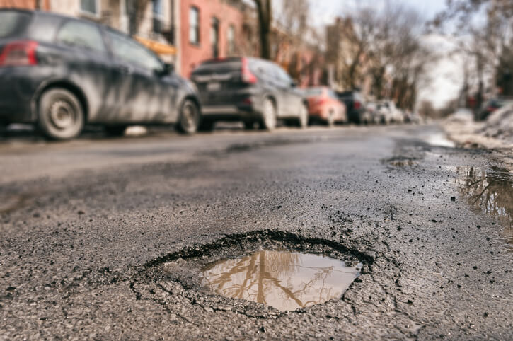Pothole Season – Prevent Vehicle Damage from Potholes article header